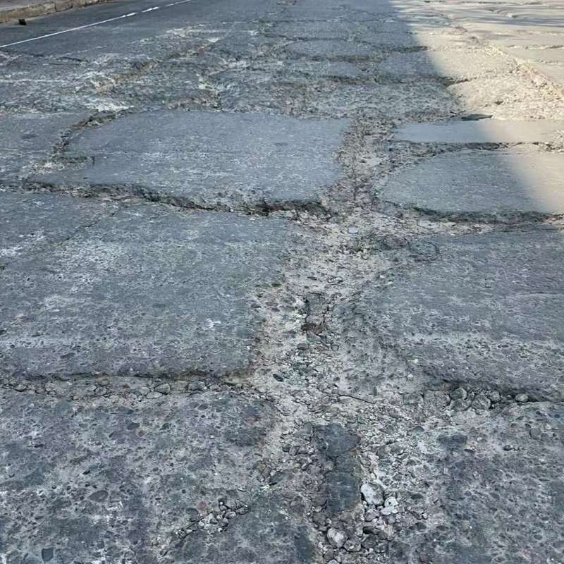 中华台北路面起砂露石子修补料
